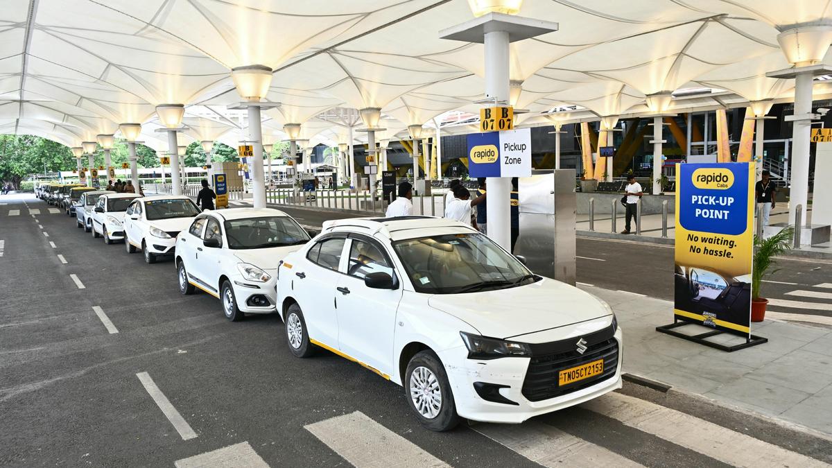 Cars waiting at an airport pickup zone